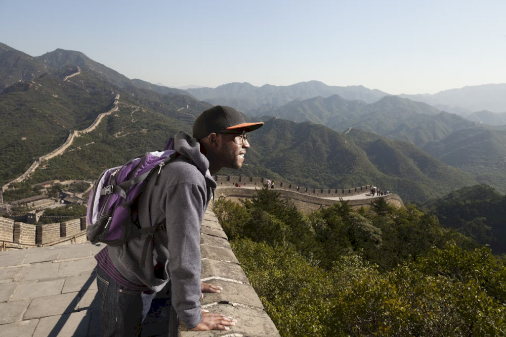 Standing from the Great Wall, visitors can admire the natural scenery and part of Xi'an city